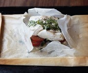 Cod, coriander, tomato & garlic parcels recipe